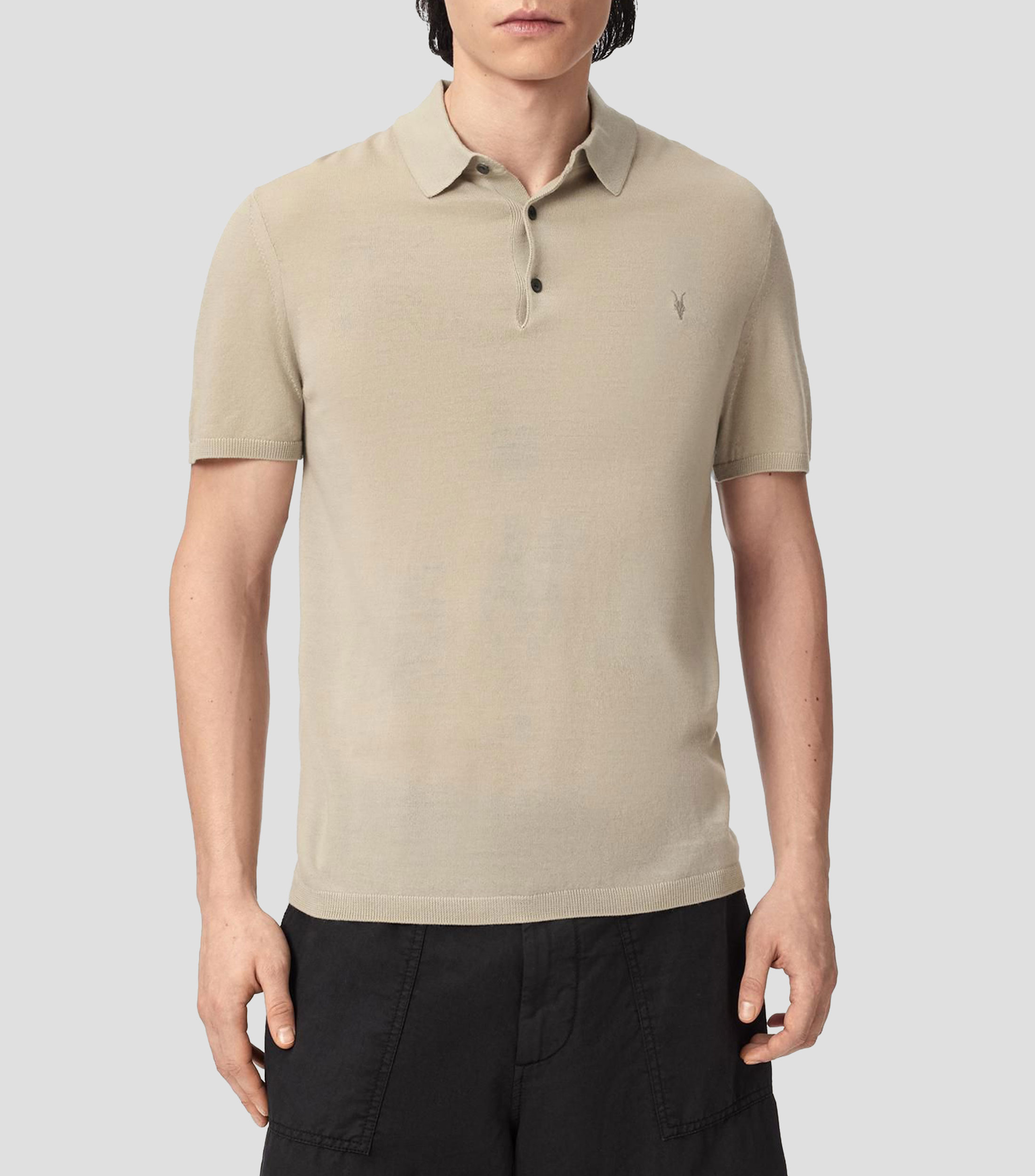 Playera tipo polo con manga corta lisa Hombre